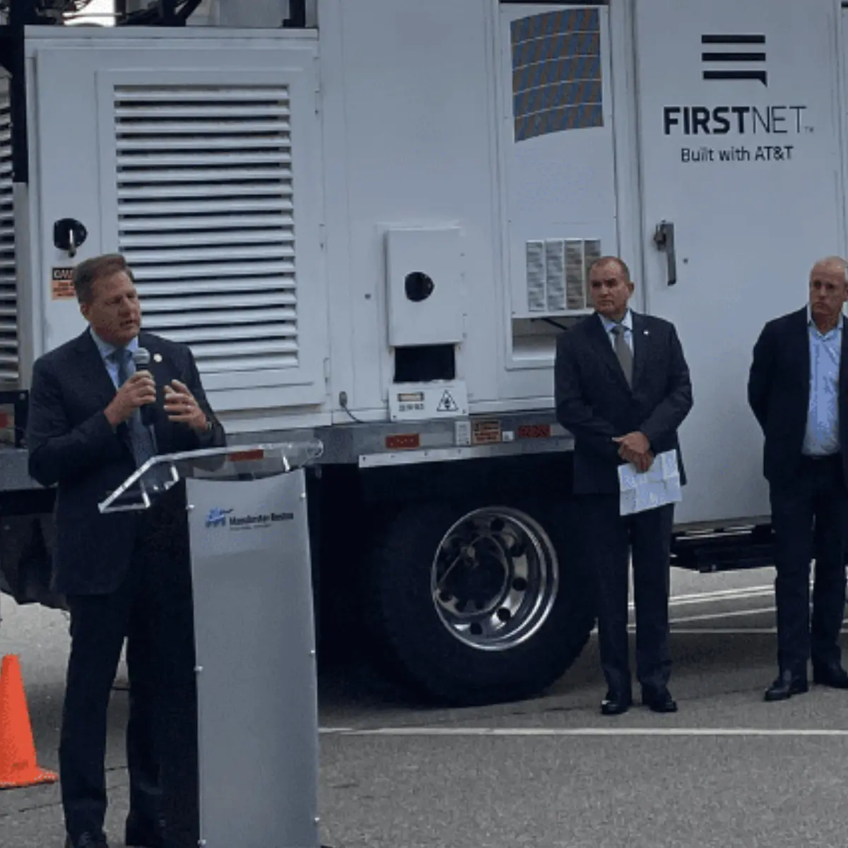 The Governor of NH speaking in front of a FirstNet truck