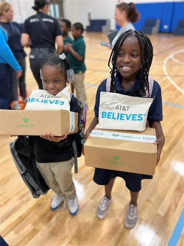 Children holding boxes