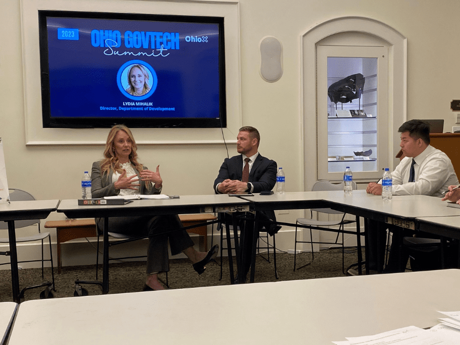 Woman speaking at a panel