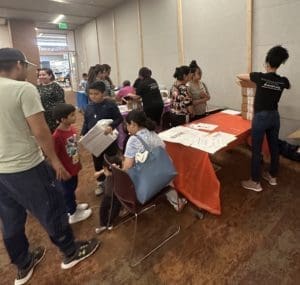 Students receiving laptops