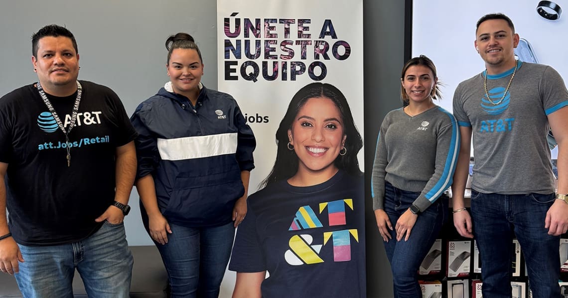 People standing in front of an AT&T banner