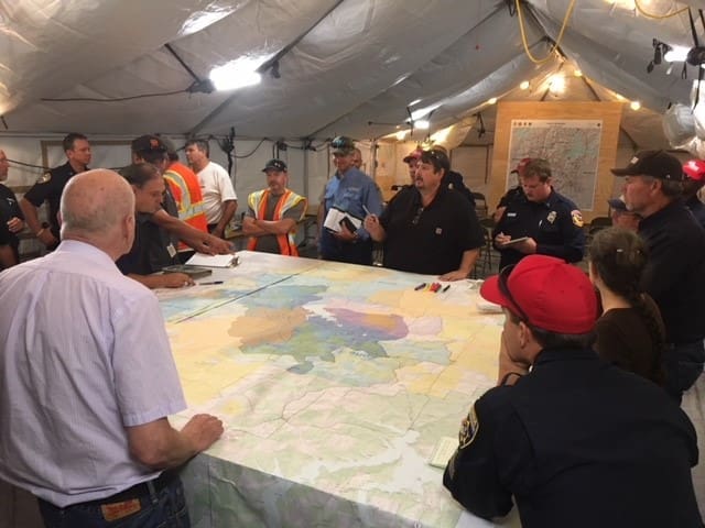 CA Wildfire Command Reviewing Map