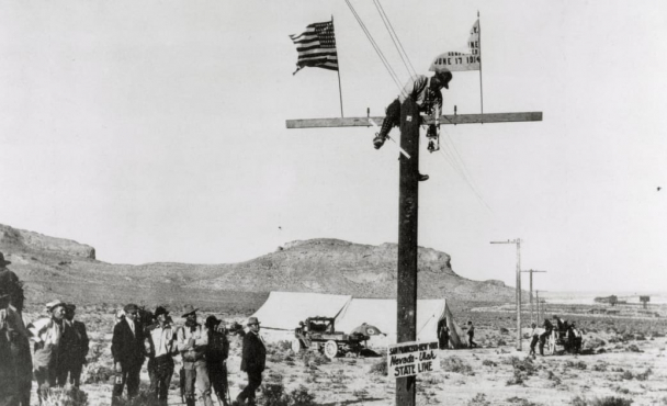 Person on telephone pole