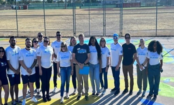 People on the playground taking a photo