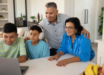 Family looking at computer