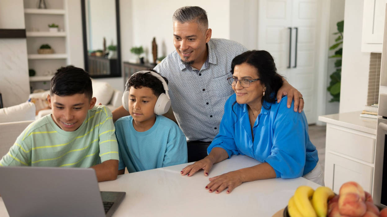 Family looking at computer