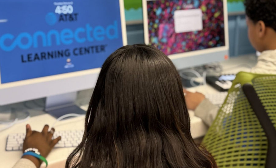 Students looking at computers