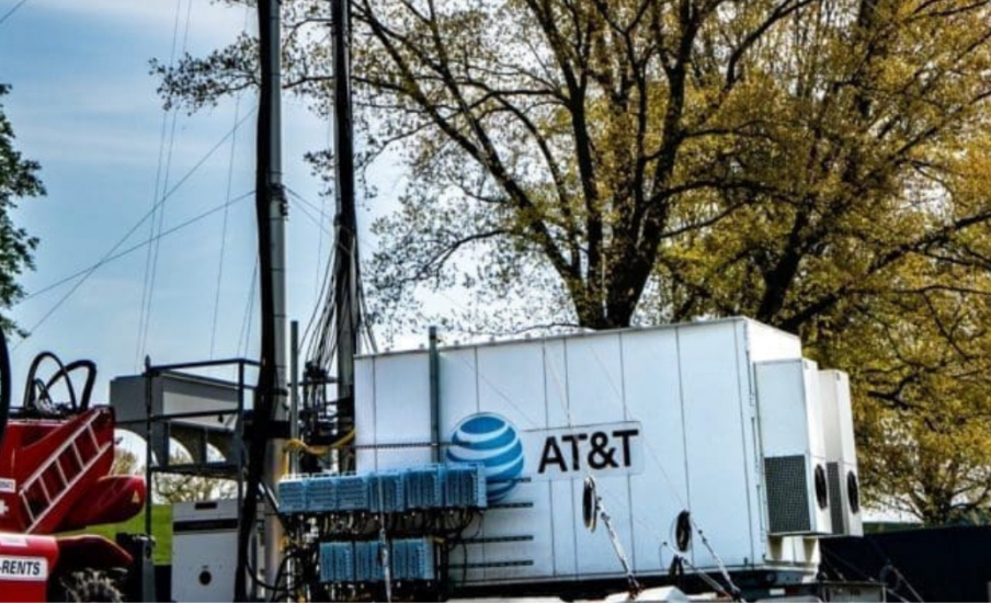 AT&T truck outside next to a tree