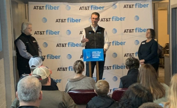A man speaking at a podium
