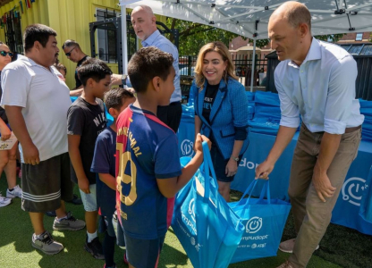 Person handing out bag at AT&T event