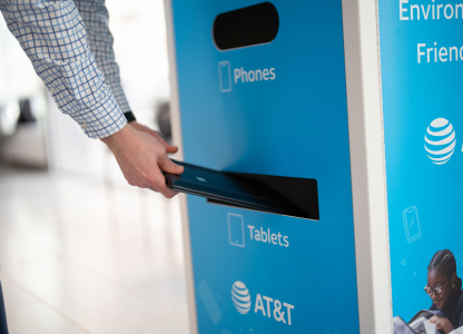 Person recycling their technology.