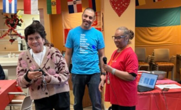 Elderly woman participating at community event.