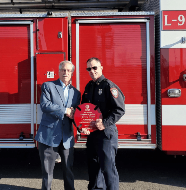 A firefighter receving an award