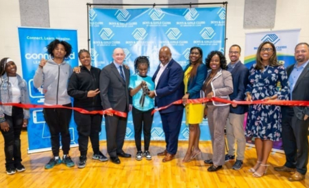 Picture of the ribbon cutting for the event