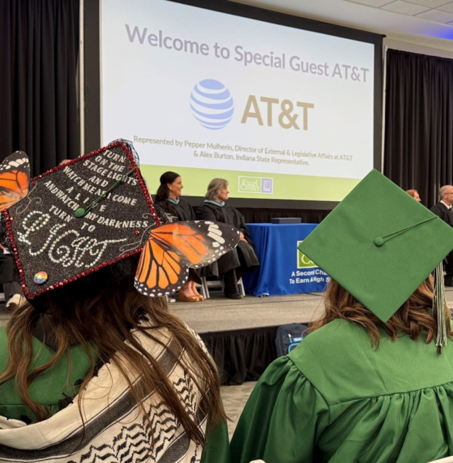 Students at graduation with AT&T guest speaker