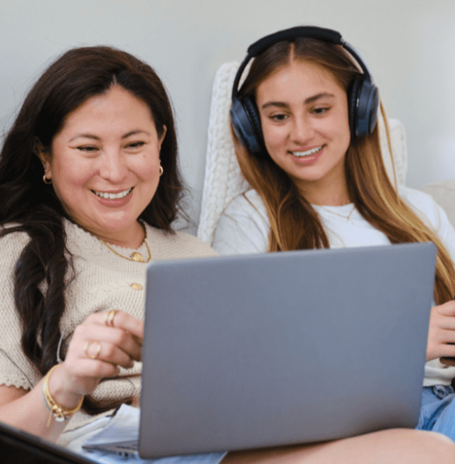 Mom and daughter with laptop