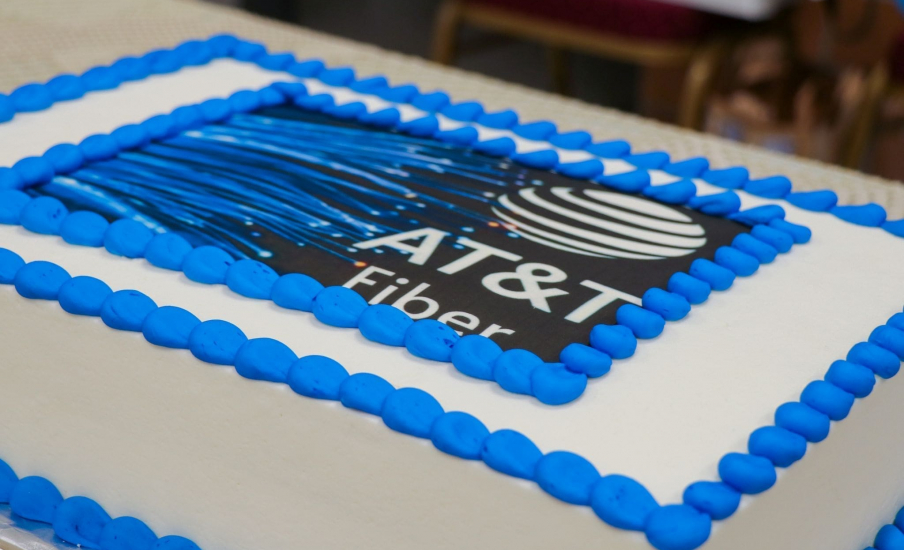 A cake with AT&T Fiber logo on it.