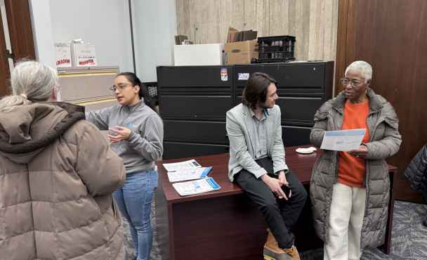 Four people standing together