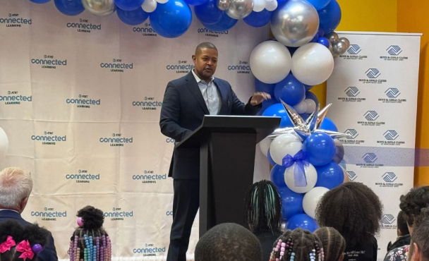 Man speaking at podium at AT&T event