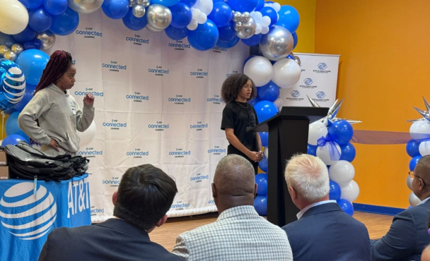 Young girl speaking at podium