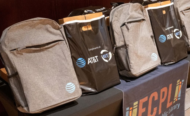 Backpacks lined up at AT&T event