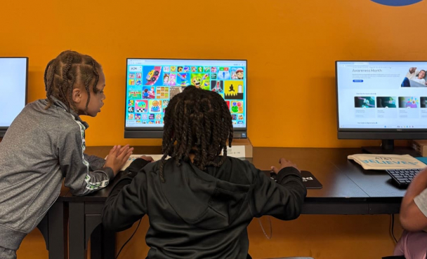 Two children at computer