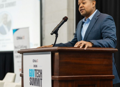 Man standing at podium.