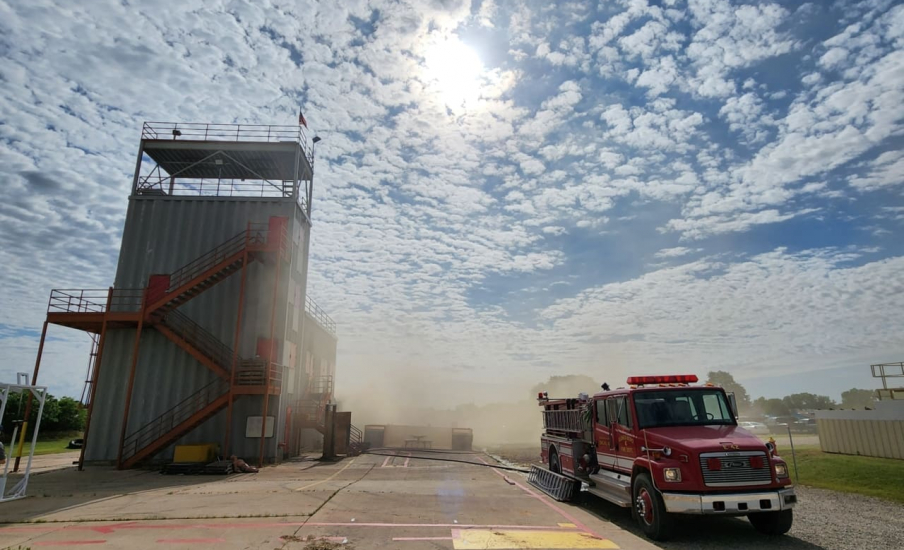 an image of a steel structure with staircases on the outside.