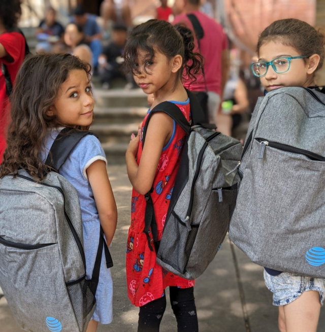 Little girls with backpacks
