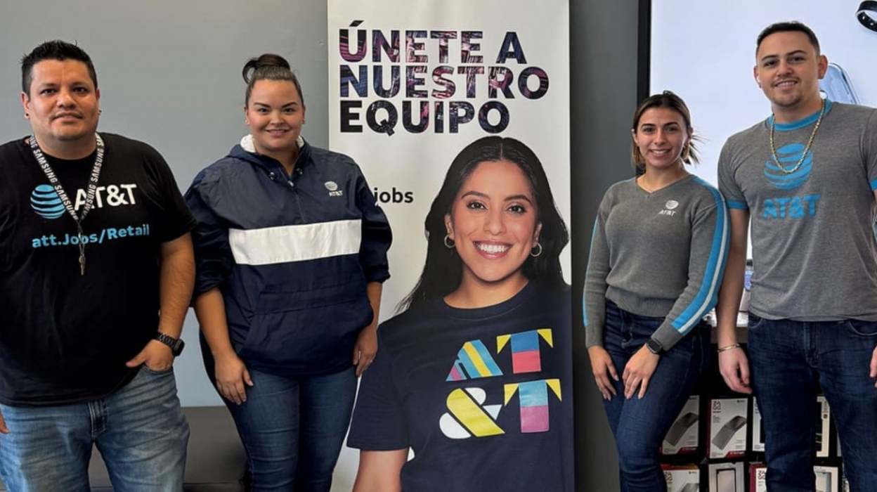 People standing in front of an AT&T banner